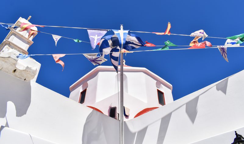 A picturesque corner of the Church of Saint Kyriaki in Mykonos, Greece.