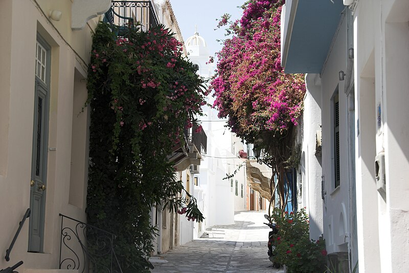 Whitewashed buildings and narrow lanes in the old part of Tinos Town with traditional Cycladic architecture