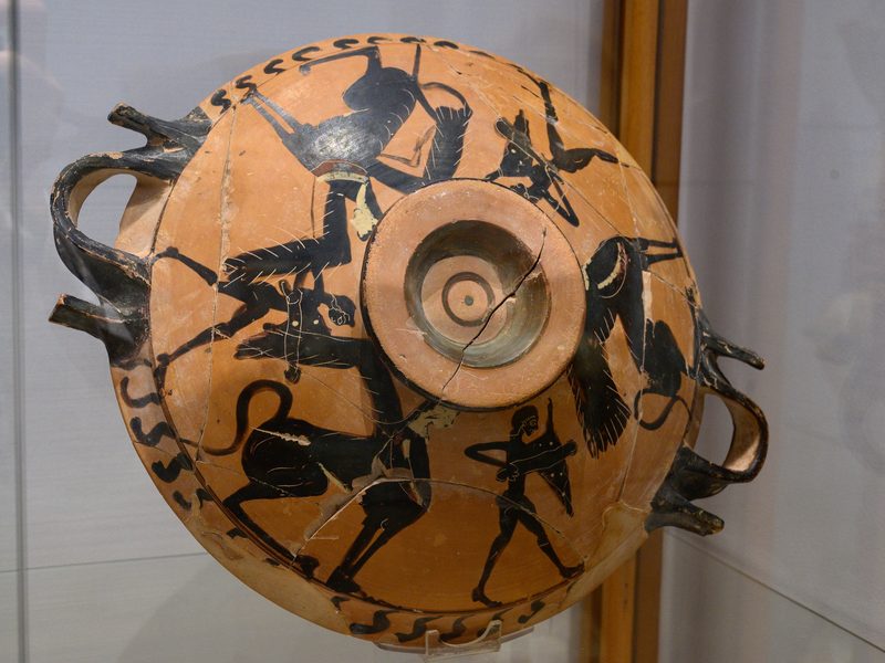 Ancient Greek kylix depicting Herakles and Sphinxes at the Archaeological Museum of Mykonos.