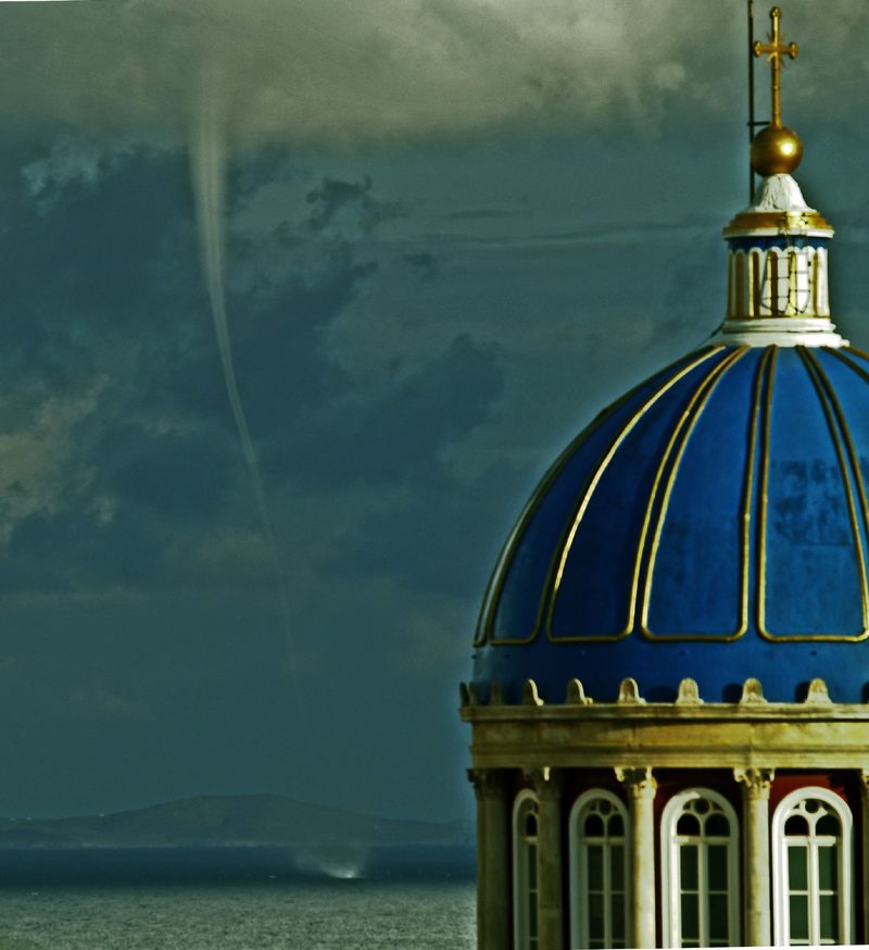 A waterspout forms over the sea between Syros and Mykonos.