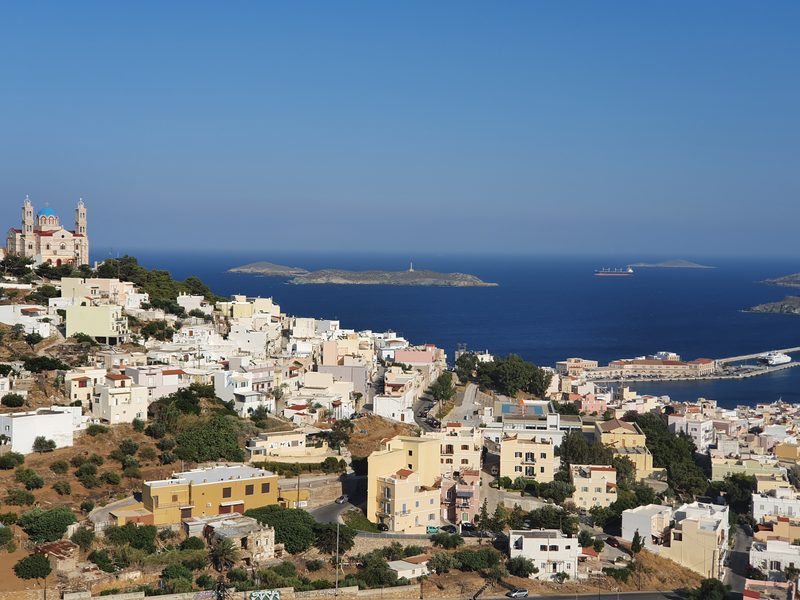 A hillside view over the rooftops and harbour of Ermoupoli on Syros, seen from Ano Syros