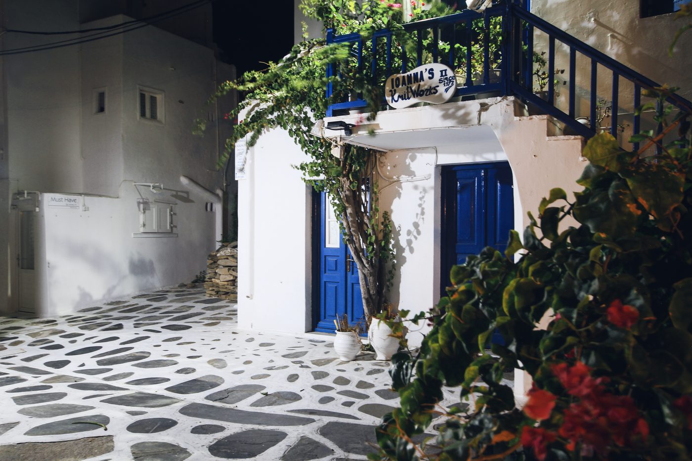 The streets of Mykonos town illuminated at night