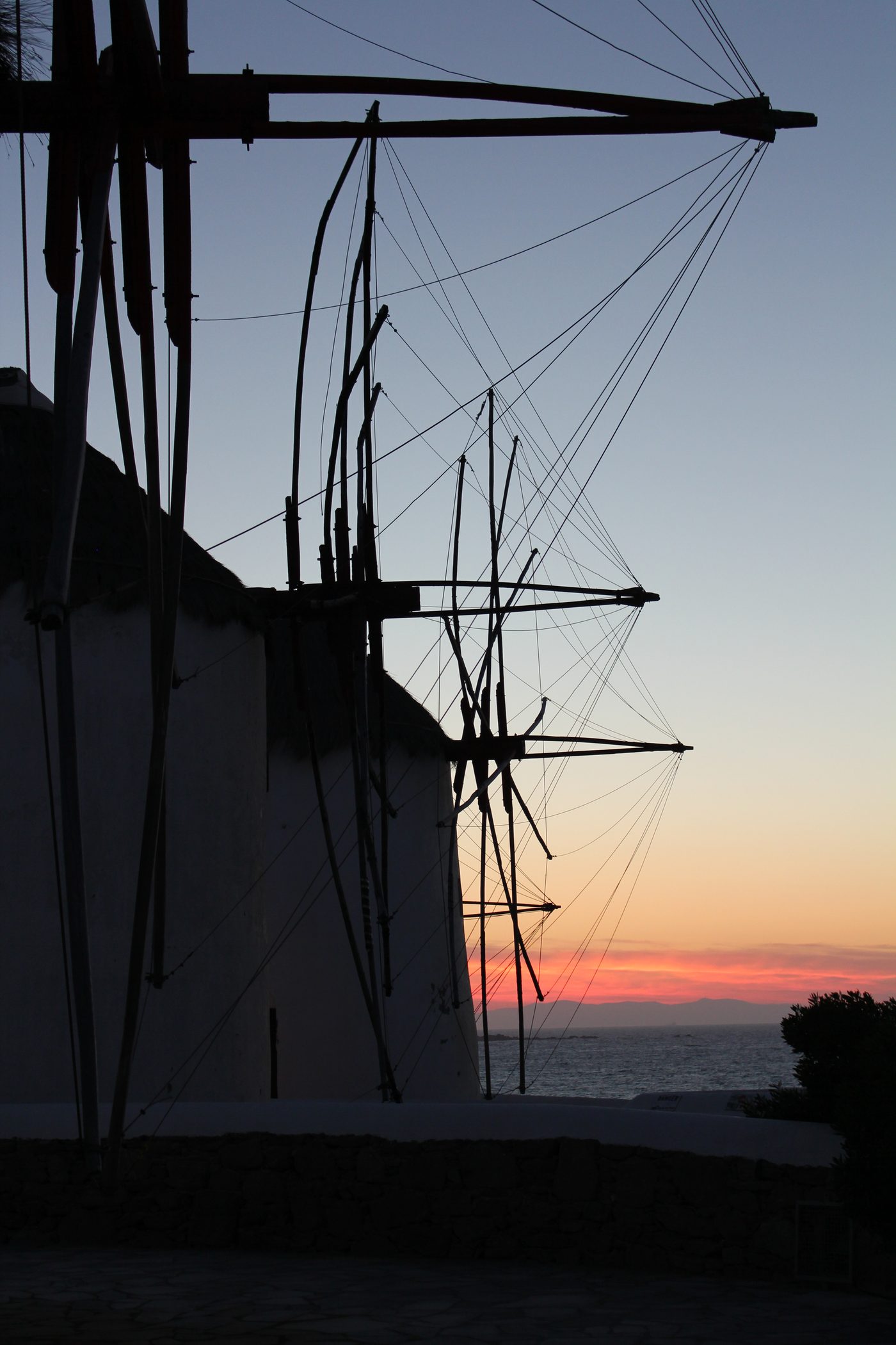 The famous row of Kato Mili windmills overlooking the harbour of Mykonos